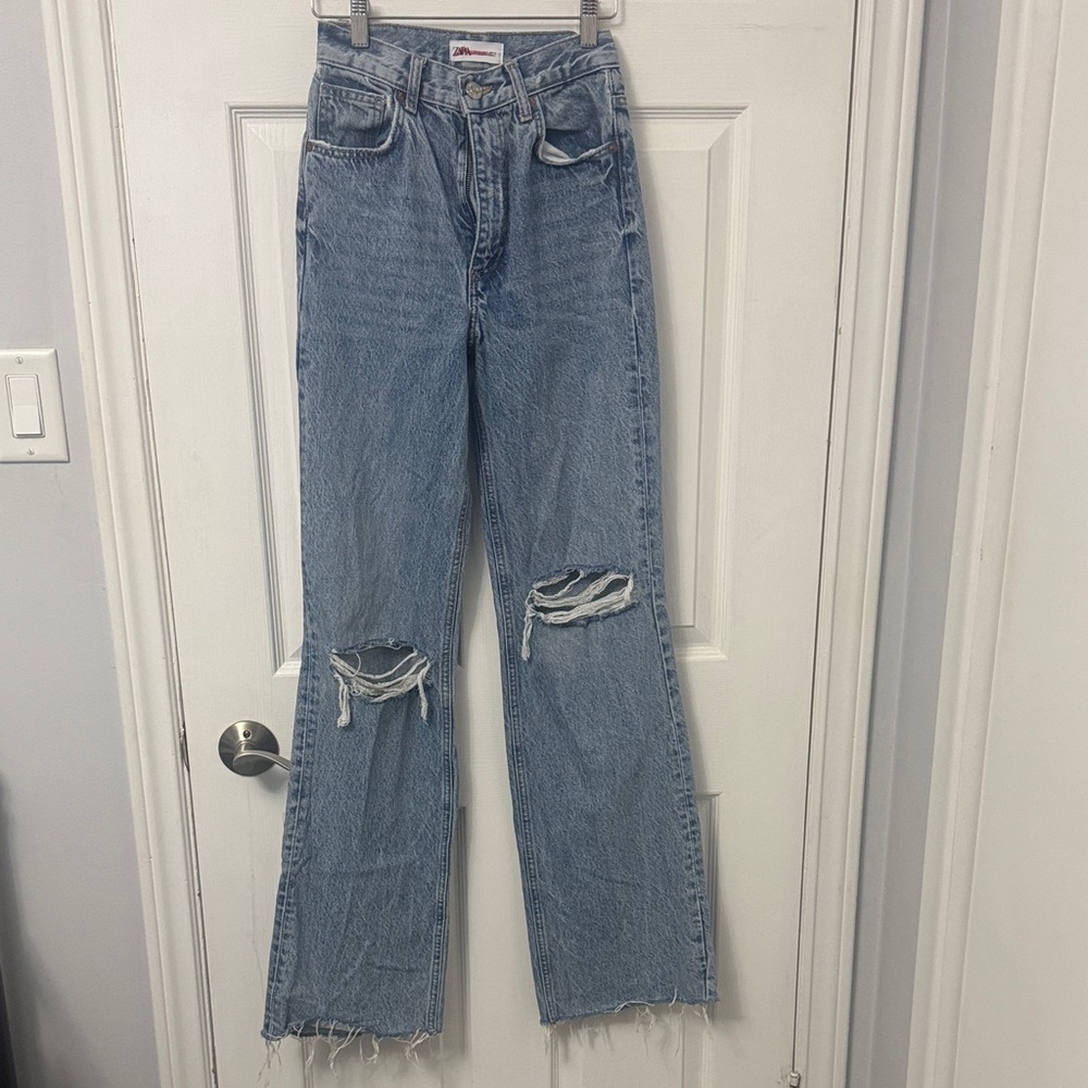8. Zara Blue Distressed Flare Jeans